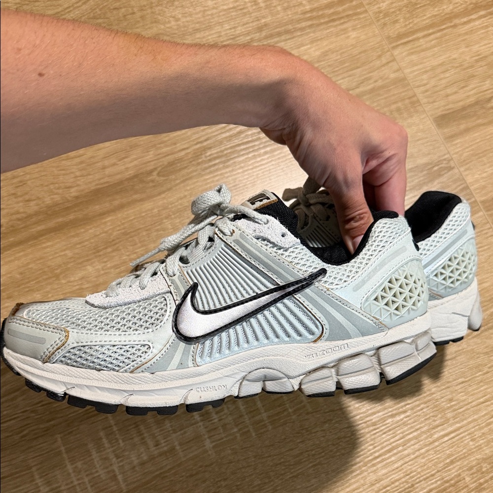 Nike Cream and Black Running Shoes